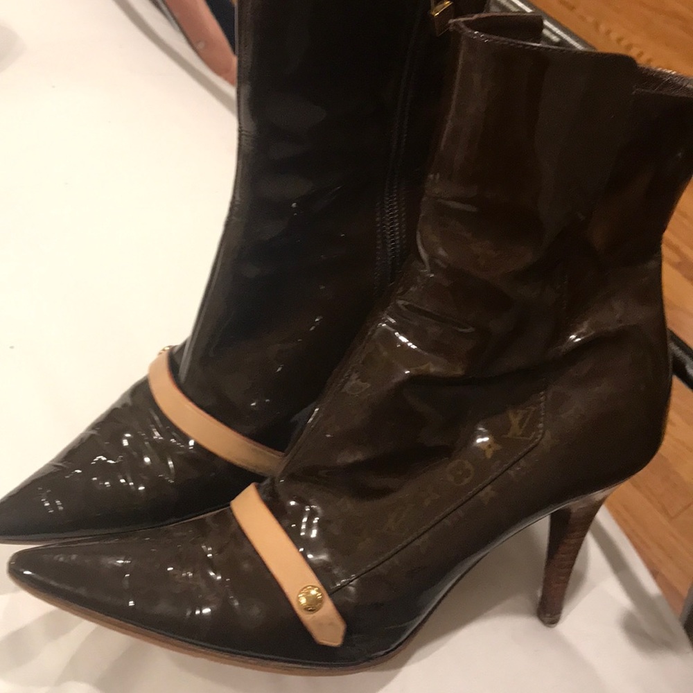 Patent leather Louis Vuitton ankle boots.